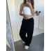 Спортивні штани для повсякденного носіння, широкі палаццо з фіксаторами, чорний 42-46 арт. 815324 Спортивні штани для повсякденного носіння, широкі палаццо з фіксаторами, чорний 42-46 арт. 815324